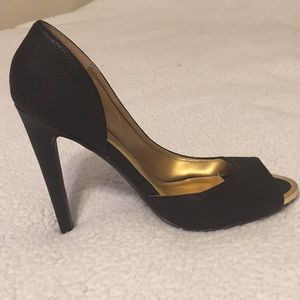 Sexy Black 4 inch heels with gold interior.